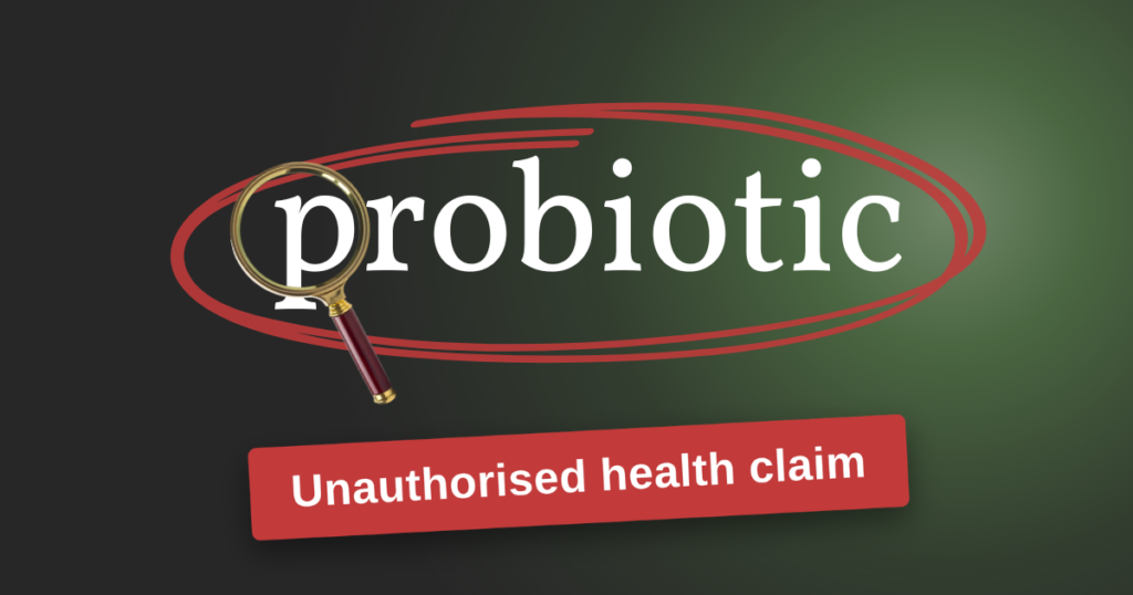 The word "probiotic" circled in red under a magnifying glass, flagged as an unauthorised health claim in the UK.
